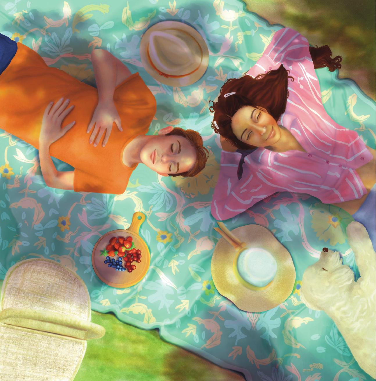 Friends relaxing on a picnic blanket